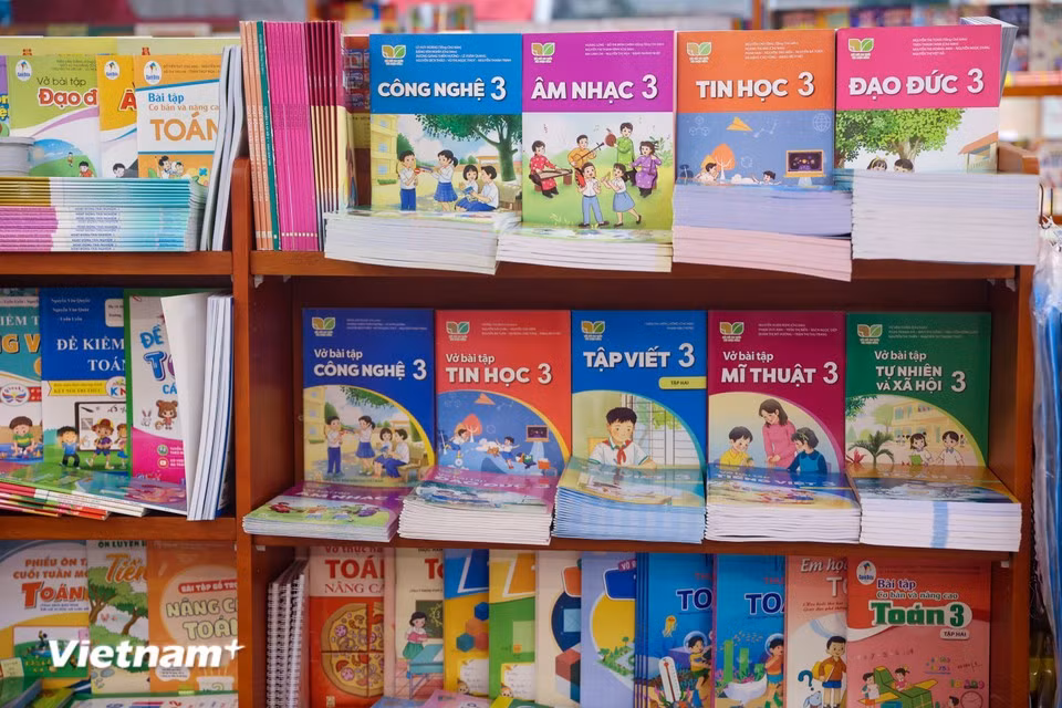 Retailers are fully stocked with textbooks, ready to serve families preparing for the new academic year. (Photo: VietnamPlus)