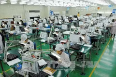 Electronic components production line at Flexcom Vietnam Co., Ltd. in Yen Phong Industrial Park, Bac Ninh province (Photo: VNA)