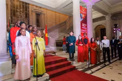 Performance of the two national anthems at the anniversary celebration. (Photo: VNA)