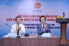 Deputy Minister of Home Affairs Cao Huy (L) and ILO's representative Felix Weidencaff co-chair the workshop (Photo: VNA)