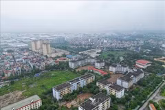The Ministry of Construction plans to ease permit procedures for projects with approved 1/500 detailed planning, aiming to cut red tape and speed up approvals. (Photo: VNA)