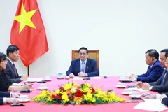 Prime Minister Pham Minh Chinh in the phone conversation with his Australian counterpart Anthony Albanese on May 6. (Photo: VNA)