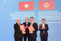 Various cooperation agreements between the two countries are signed during Kyrgyz PM Adylbek Kasymaliev's official visit to Vietnam from March 6-7. (Photo: VNA)