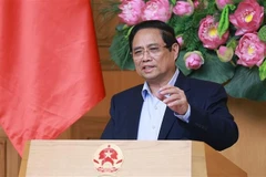 Two-tier local administration system operates stably, smoothly after one month: PM