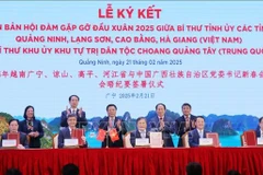 Twenty-nine Memoranda of Understanding are inked between Vietnamese and Chinese localities on February 21, strengthening cooperation across various sectors. (Photo: VNA)