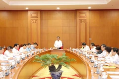 A meeting chaired by Politburo member and Permanent Member of the Party Central Committee’s Secretariat Tran Cam Tu with Party committees, central agencies, and mass organisations on October 16 (Photo: VNA)
