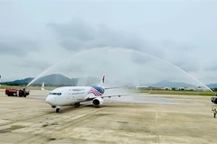 A plane from Malaysia Airlines is welcomed at Da Nang International Airport. The airport has been preparing for new growth in the decades ahead. (Photo courtesy of ACV Da Nang) 