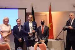 Belgium golf tournament raises funds for AO victims