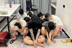 Suspects detained during a police raid on a scam centre in Phnom Penh, Cambodia, on July 16 (Photo: EPA)