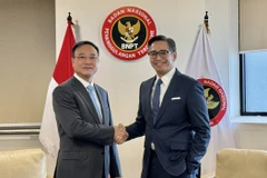 Lieutenant General Pham The Tung, Deputy Minister of Public Security of Vietnam (L) and Deputy Director of Indonesia's National Counterterrorism Agency (BNPT) Andhika Chrisnayudhanto (Photo: VNA)