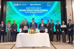 The strategic alliance signing ceremony on September 18. (Photo: VNA)