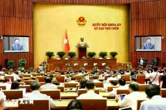 At the 9th session of the 15th National Assembly (Photo: VNA)