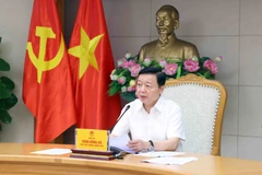 Deputy Prime Minister Tran Hong Ha speaks at the meeting on May 7. (Photo: VNA)
