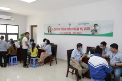 Screening for children with cleft lip and palate in the programme (Photo: VNA)
