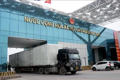 Vehicles transporting goods via the Mong Cai International Border Gate. (Photo: VNA)