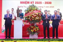 Party General Secretary To Lam (L) attends the first congress of Nghia Tru commune's Party orgnisation on July 14. (Photo: VNA)