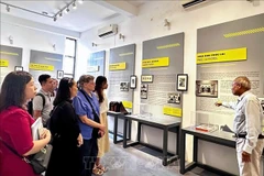 Visitors at the Lai Xa Photography Museum in Hoai Duc commune, Ha Noi (Photo: VNA)