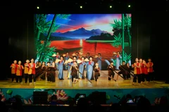 Nghe An students confidently perform Vi and Giam folk songs on stage. (Photo: VNA)