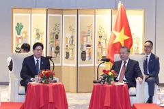 Party General Secretary To Lam (R) receives Busan Mayor Park Hyeong Jun on August 13. (Photo: VNA)