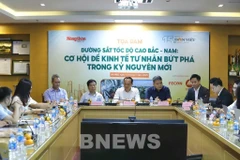 At the forum held by the Dan viet newspaper (Photo: VNA)