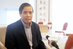 Professor Vu Minh Khuong from the Lee Kuan Yew School of Public Policy in Singapore (Photo: VNA)