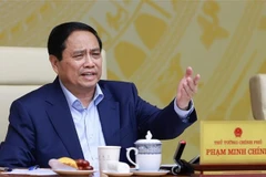 Prime Minister Pham Minh Chinh at the national online conference on July 16. (Photo: VNA)