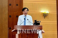 Minister-Chairman of the Government Office Tran Van Son speaks at the press briefing on July 3. (Photo: VNA)