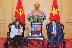 President of the Ho Chi Minh National Academy of Politics (HCMA) and Chairman of the Central Theory Council Professor Dr. Nguyen Xuan Thang meets with Venezuela’s Deputy Minister of Foreign Affairs in charge of Asia, the Middle East, and Oceania Tatiana Pugh Moreno in Hanoi on October 23. (Photo: VNA)
