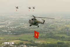 Helicopters, fighter jets soar over Ho Chi Minh City skies