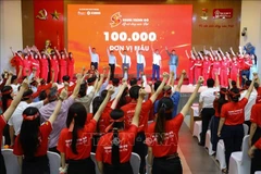 At the launch of the Red Journey blood donation campaign. (Photo: VNA)