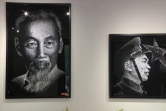 Vietnamese artist crafts portraits of national heroes with a hammer