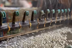 Preserving and developing the brand of Co Chat silk reeling village