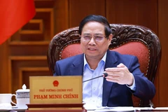 Prime Minister Pham Minh Chinh calls for breakthrough policies for Vietnam's international financial centre. (Photo: VNA)