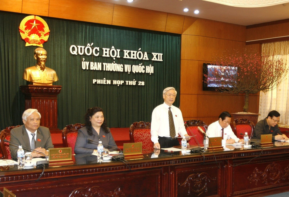 National Assembly Chairman Nguyen Phu Trong delivers opening speech at the 28th session of the 12th National Assembly Standing Committee in Hanoi, on February 9, 2010. (Photo: VNA)