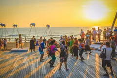 Visitors enjoy the sunset at Sunset Sanato Beach in Phu Quoc. (Photo: VNA)