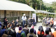 Canada’s Secretary of State for International Development Randeep Sarai speaks with beneficiary households of a project supporting the recovery of agricultural production after natural disasters in Lao Cai. (Photo: baolaocai.vn)
