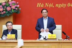 Prime Minister Pham Minh Chinh, Secretary of the Government Party Committee, speaks at the event. (Photo: VNA)