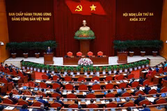 A view of the closing session of the third plenum of the 14th Party Central Committee in Hanoi on July 24 (Photo: VNA)