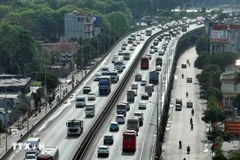 Vehicles travel on Ring Road 3 (Photo: VNA)