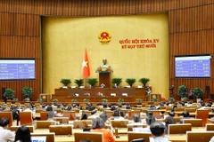 At a NA working session (Photo: VNA)