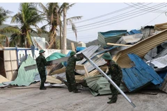 Prime Minister Pham Minh Chinh urges localities in the central region to assess storm and flood damage and expedite recovery efforts. (Photo: VNA)