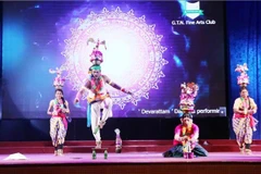 Indian artists perform at the event. (Photo: VNA)