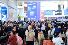Passengers at Noi Bai International Airport on January 4, the final day of the New Year holiday (Photo: VNA)