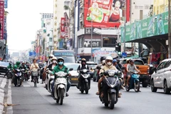 Vehicles in HCM City. The city considers installing hundreds of additional monitoring stations for air quality control. (Photo: VNA)