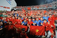Vietnam’s U22 players revel in their victory. (Photo: VNA)