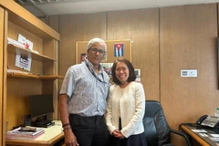 General Secretary of the Communist Party of Uruguay Juan Castillo (left) and Vietnamese Ambassador to Argentina and Uruguay. (Photo: VNA)