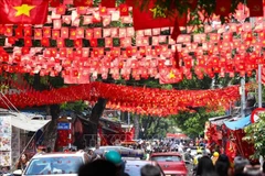 Hang Ma street in Hoan Kiem ward, Hanoi, is adorned with red flags bearing yellow stars in celebration of the 80th National Day anniversary. (Photo: VNA)