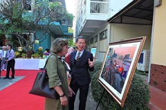 Visitors at the Bangkok exhibition featuring Vietnam’s culture, people, and landscapes. (Photo: VNA)