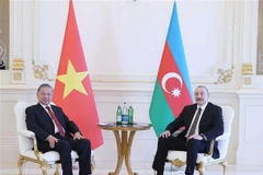 General Secretary of the Communist Party of Vietnam (CPV) Central Committee To Lam (left) and Azerbaijani President Ilham Aliyev. (Photo: VNA)