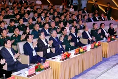 Party General Secretary To Lam, National Assembly Chairman Tran Thanh Man, and other leaders at the concert. (Photo: VNA)